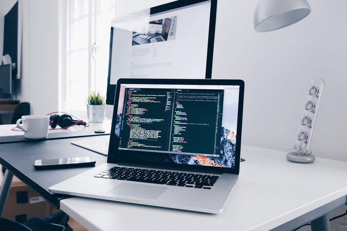 Web developer working on laptop